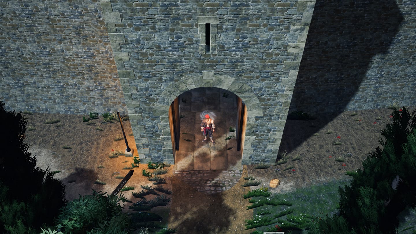 El segador sota l'arc d'un portal de muralla, il·luminat per un fanal.